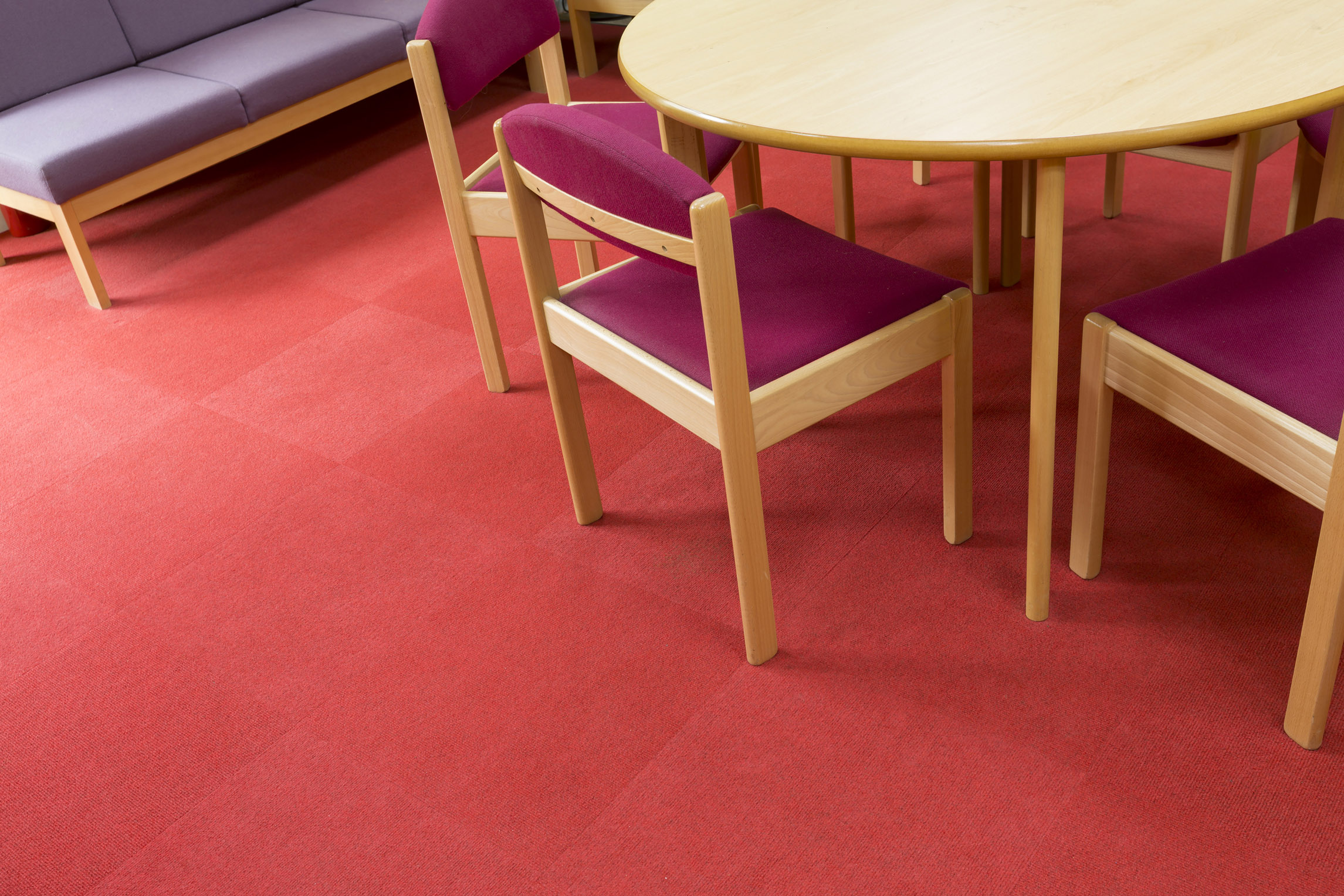 Heckmondwike Supacord Red and Carpet Tile with tables and chairs.