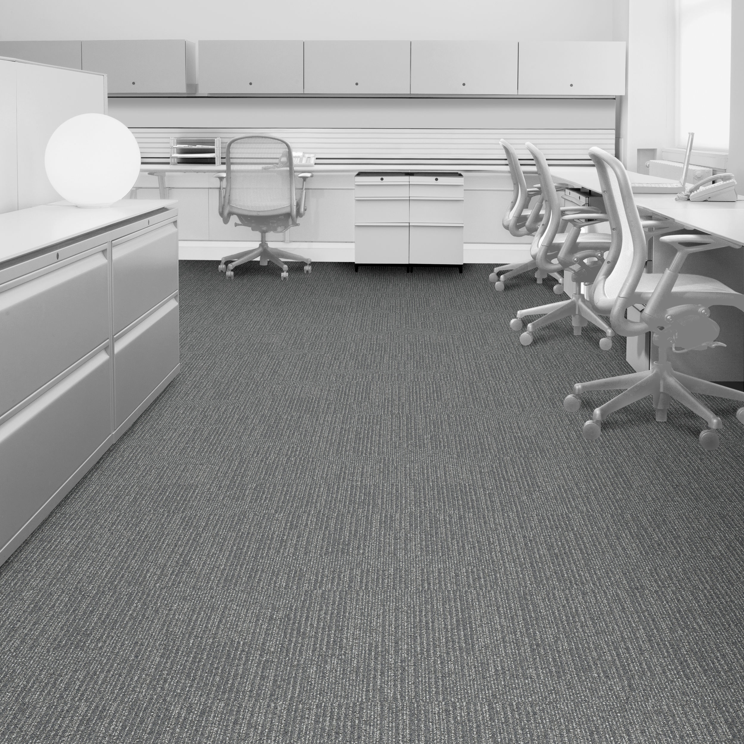 Interface Equilibrium Symmetry Carpet Tile in office setting.