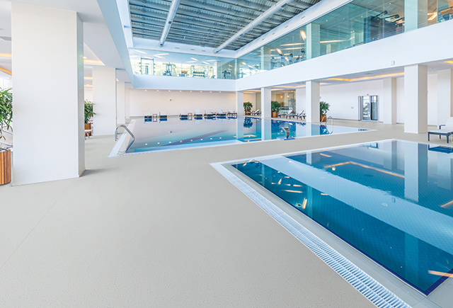 Polyflor Polysafe Quattro PUR used in swimming pool room to prevent slipping.