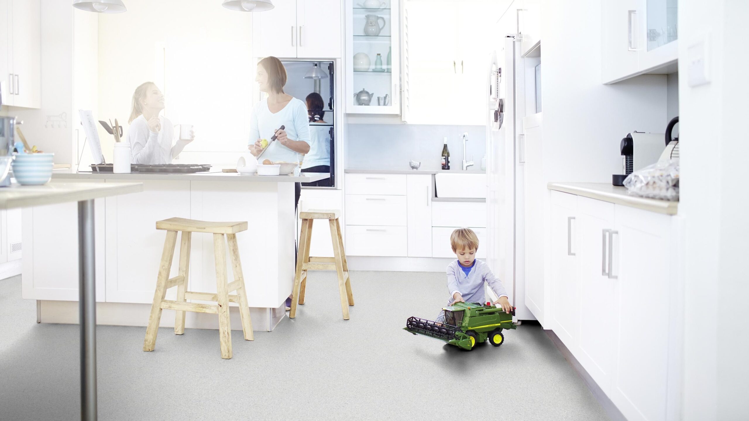 Safetread Spectrum Safety Vinyl Flooring used in a kitchen, with child playing.
