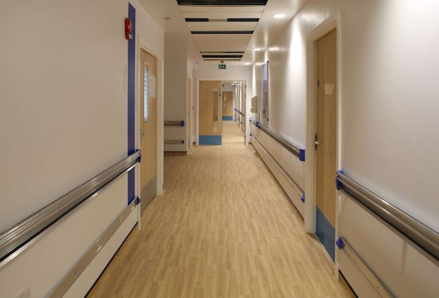 Polyflor Forest FX Pur used in hospital hallway.