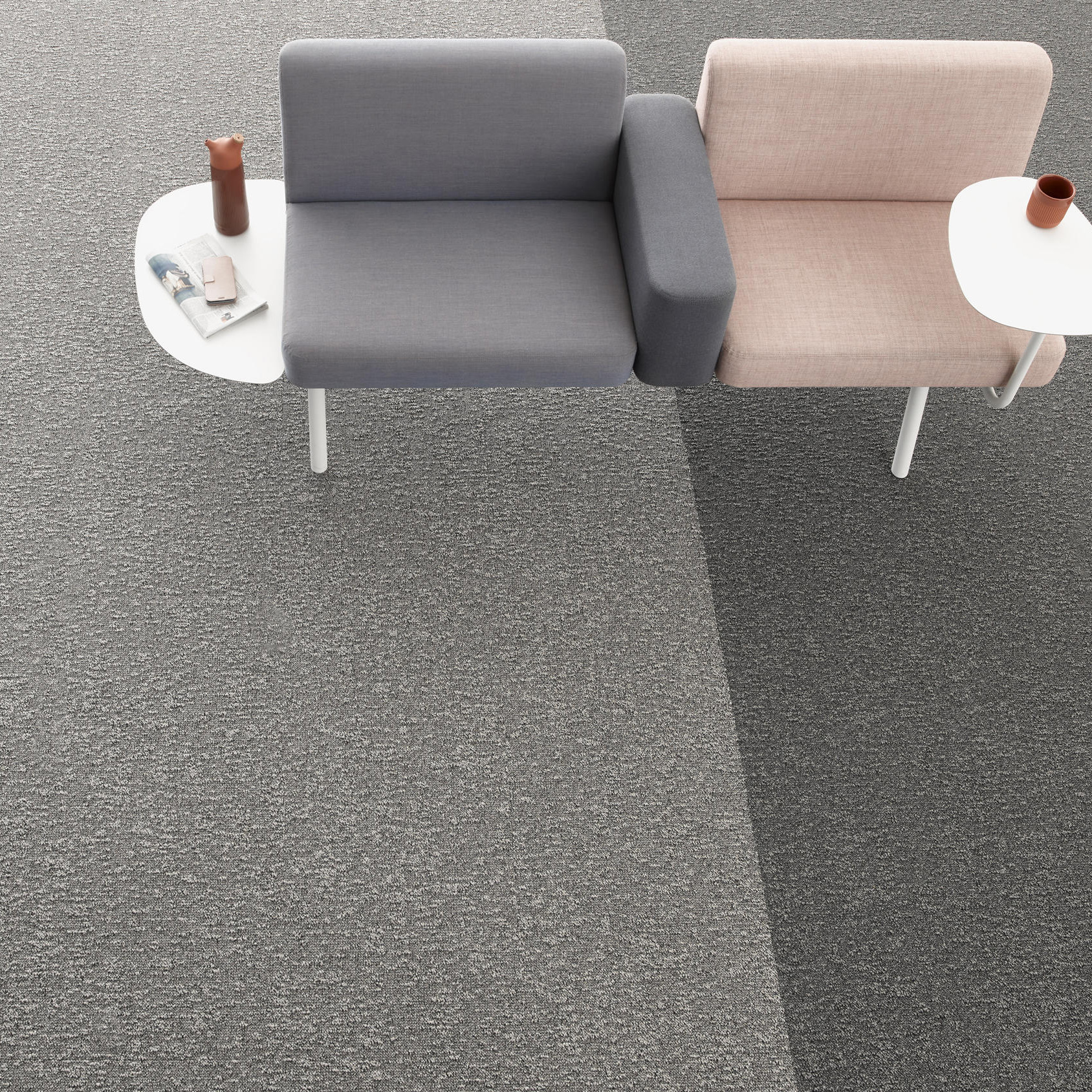 Desso Airmaster Earth Carpet Tile used in modern office space with dark grey and pink interior