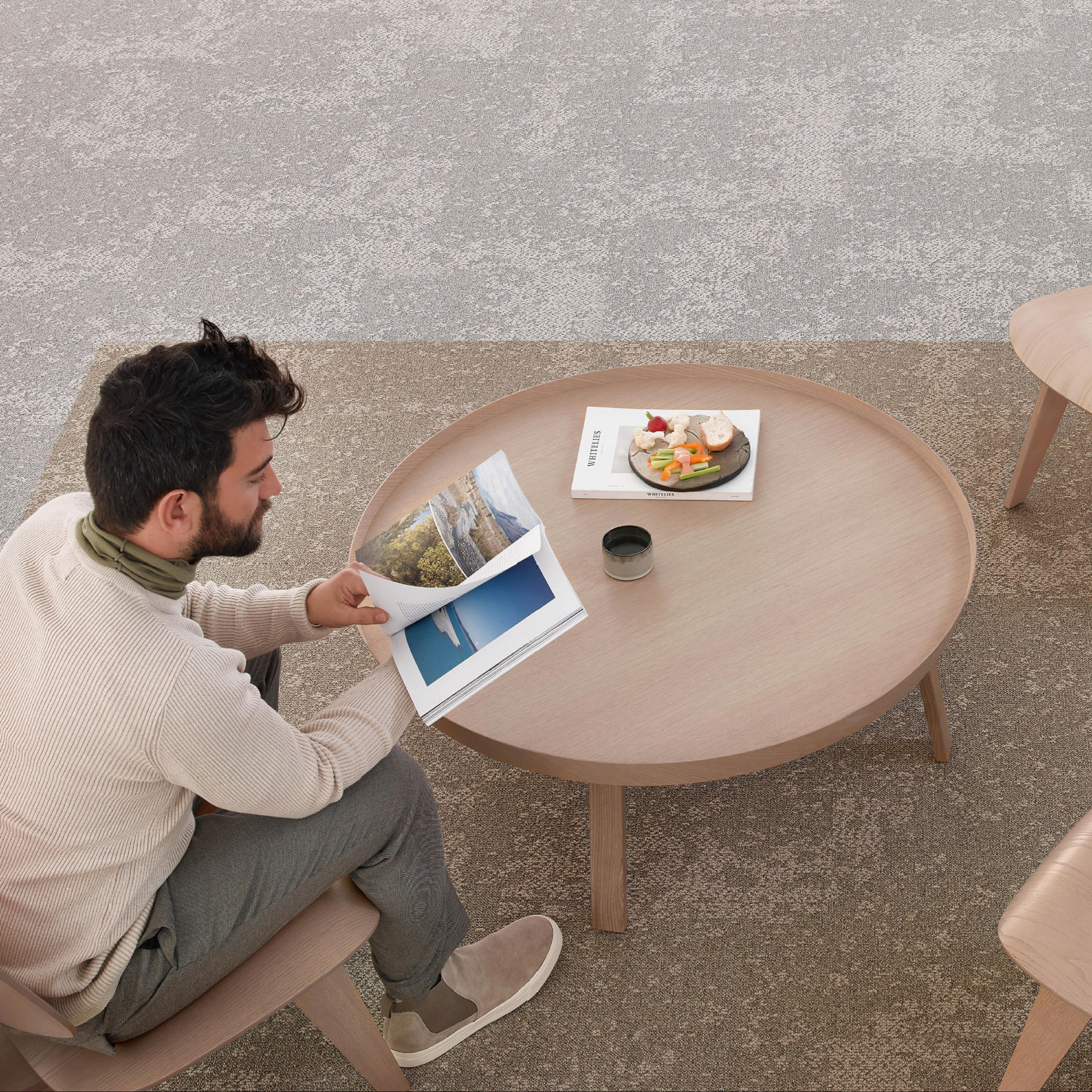 Desso Arable Carpet Tiles with man sitting at table reading