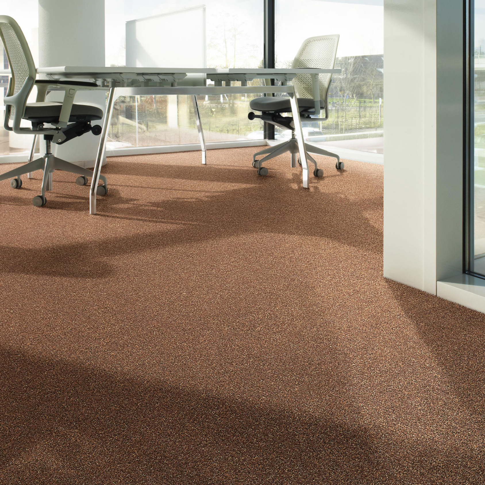 Desso Arcade Carpet Tile used in office work setting, in red tones
